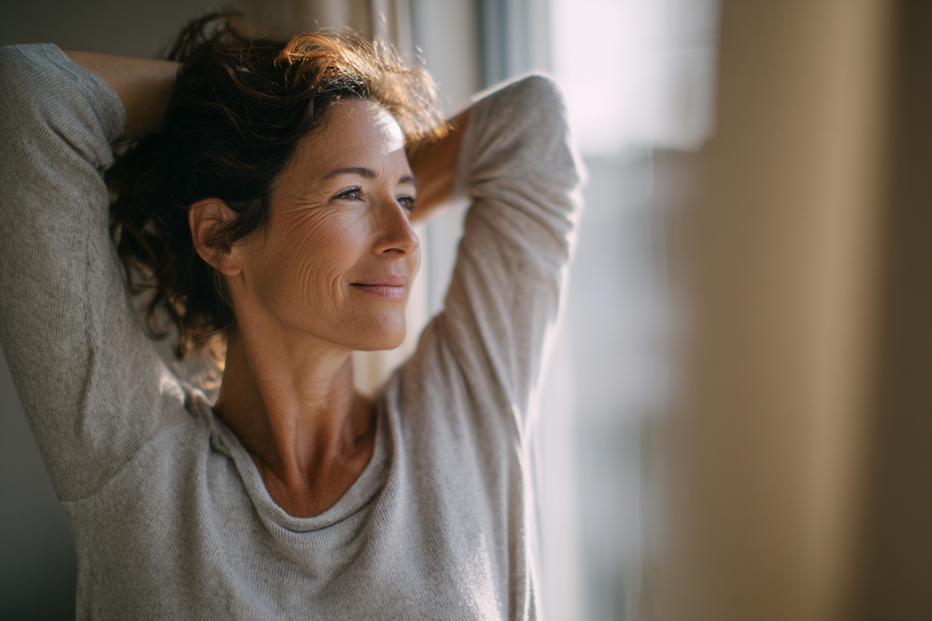 Midlife woman stretching
